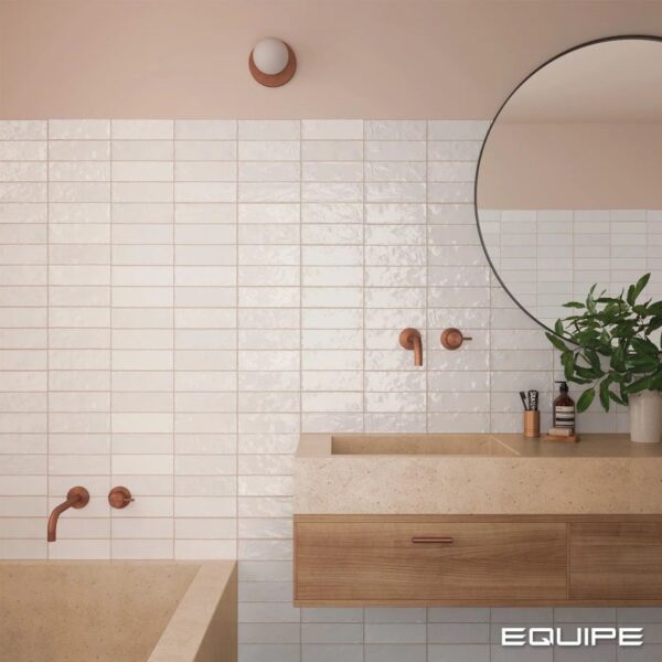 "A bathroom with a sink, a large mirror above it, and a spacious bathtub in Seattle, WA "
