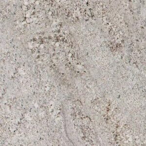 Light granite surface with natural speckled and veined texture at Tile For Less in Seattle, WA